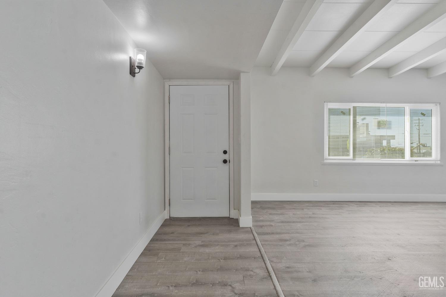 Undisclosed Address Bakersfield, CA 93305 - Photo 5 of 23 an empty room with windows