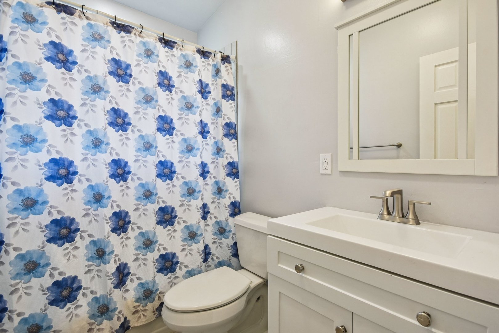 828 Lavergne Avenue Wilmette, IL 60091 - Photo 12 of 19 a bathroom with a sink toilet and shower