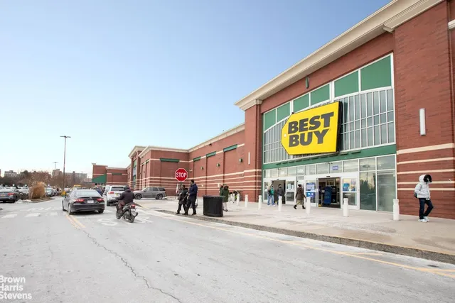 a city street with tall buildings