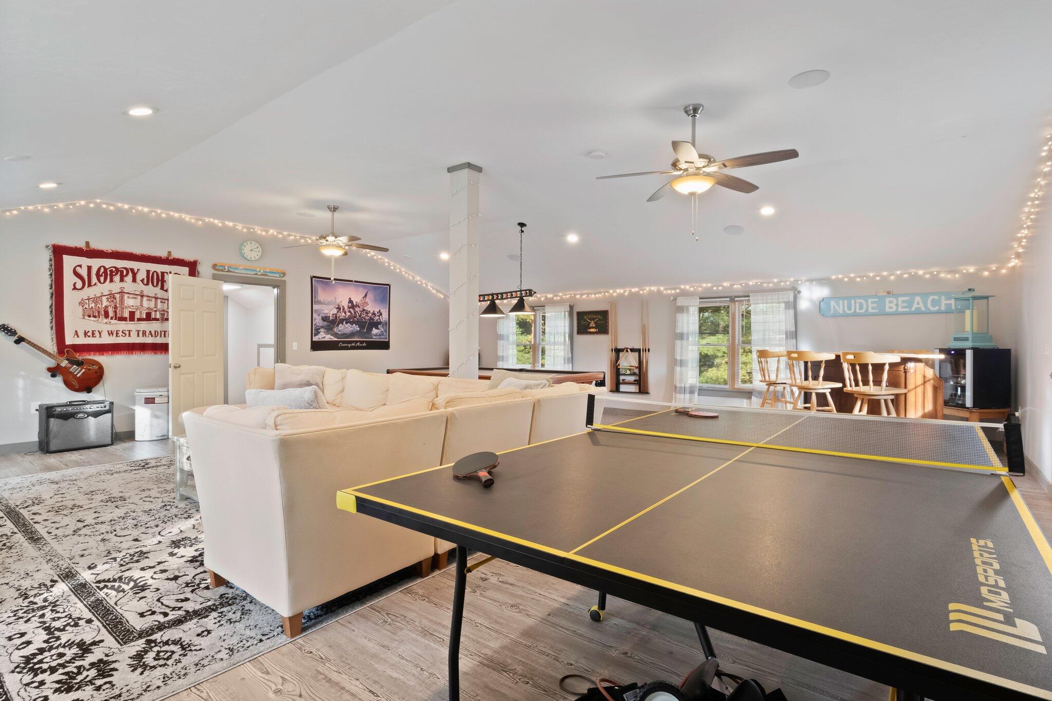 270 Mashpee Neck Road Mashpee, MA 02649 - Photo 6 of 36 a living room with furniture and a table
