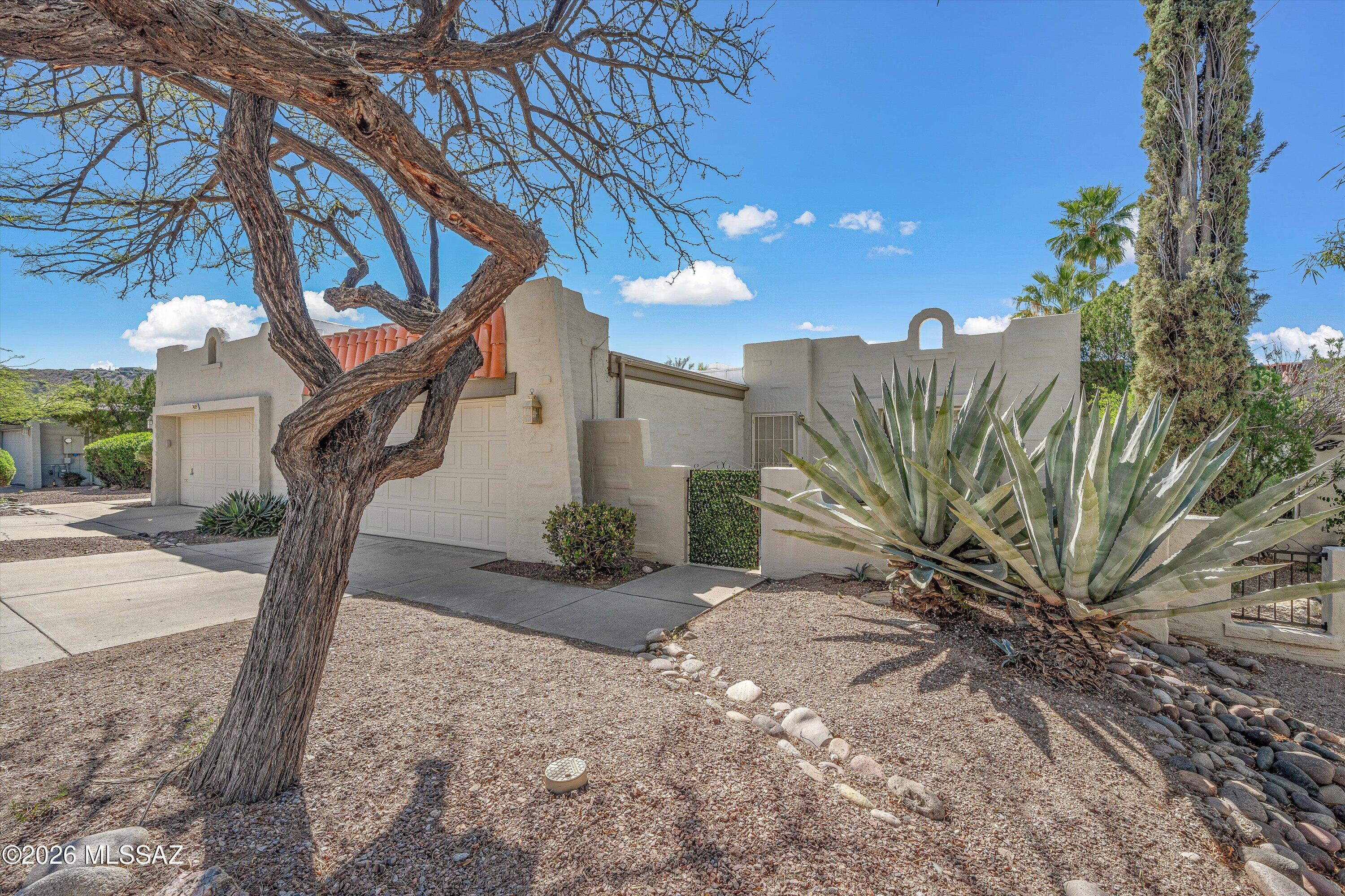 7402 East Wandering Road Tucson, AZ 85750 - Photo 3 of 38 Front of Home