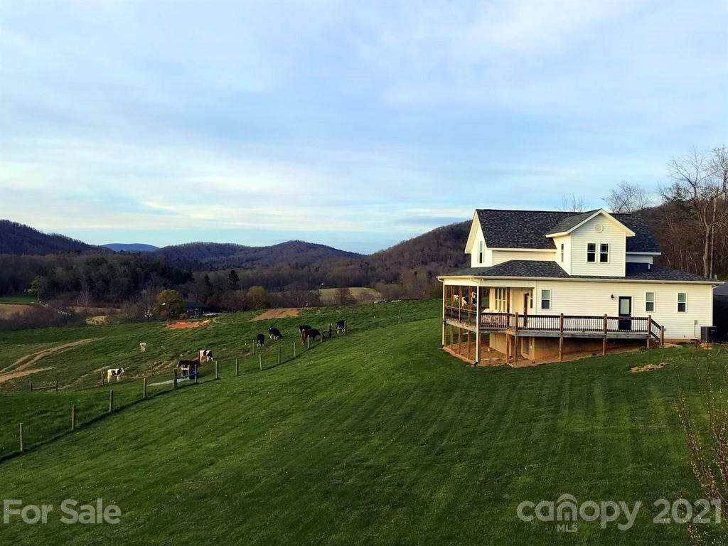 605 Souther Road Fletcher, NC 28732 - Photo 1 of 31 a view of a house with a big yard