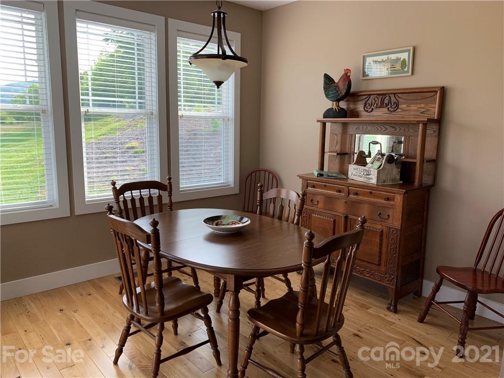 605 Souther Road Fletcher, NC 28732 - Photo 12 of 31 a view of a dining room with furniture and window