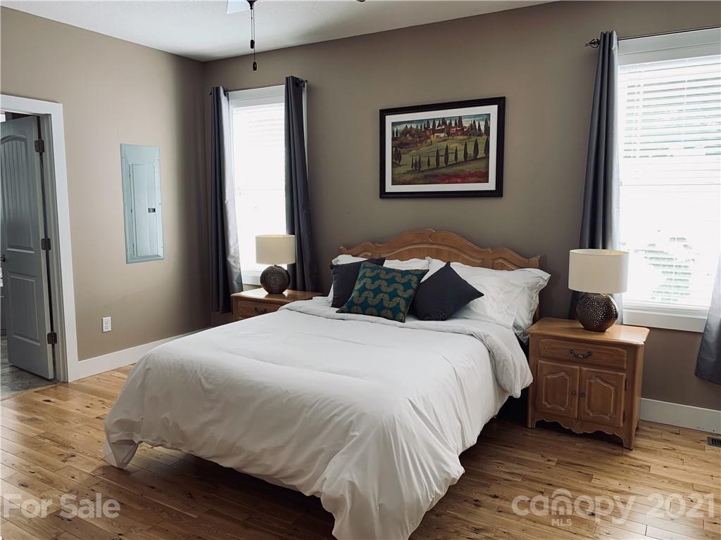 605 Souther Road Fletcher, NC 28732 - Photo 15 of 31 a bedroom with bed and window