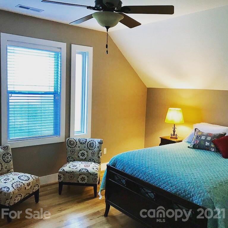 605 Souther Road Fletcher, NC 28732 - Photo 20 of 31 a bedroom with a bed and window