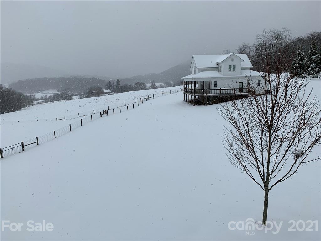 605 Souther Road Fletcher, NC 28732 - Photo 25 of 31 a view of roof and car parked
