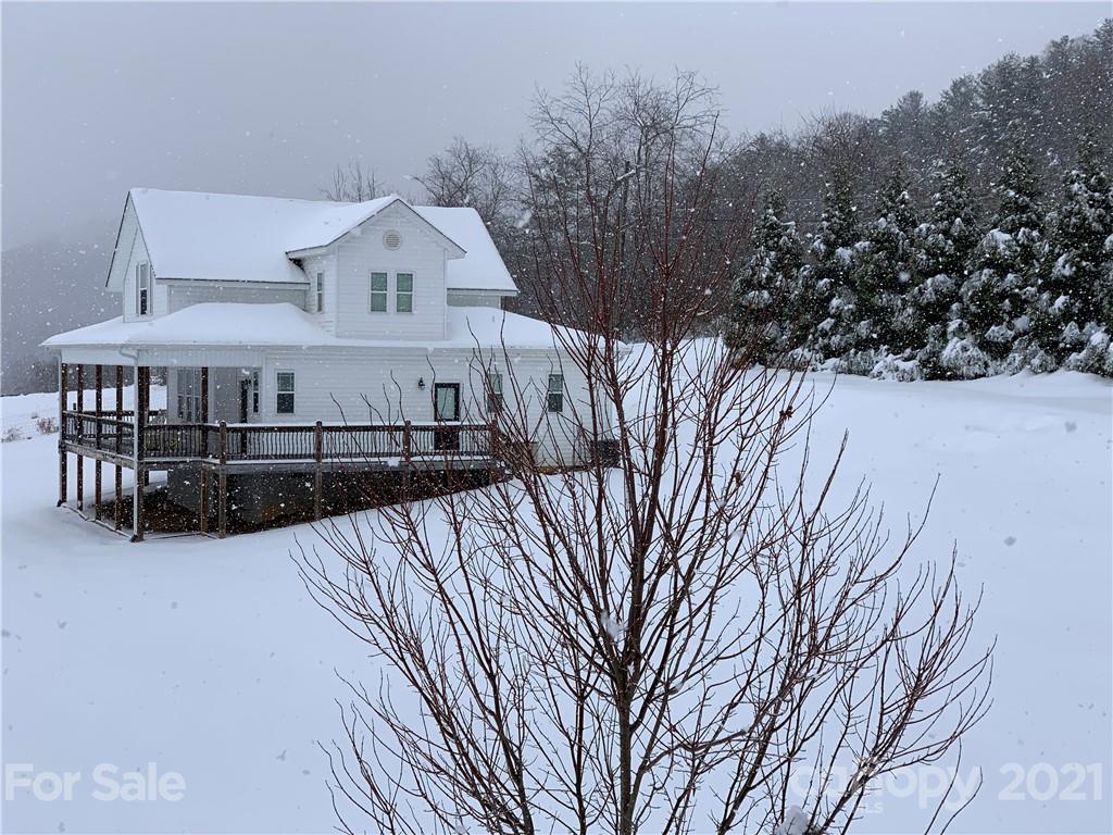 605 Souther Road Fletcher, NC 28732 - Photo 27 of 31 a view of a house with a yard
