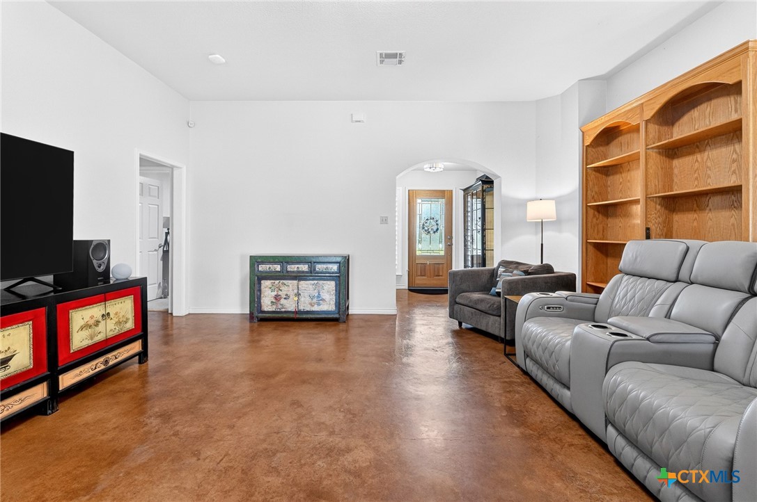 421 Sunset Ridge Drive Killeen, TX 76549 - Photo 16 of 47 a living room with furniture and a flat screen tv