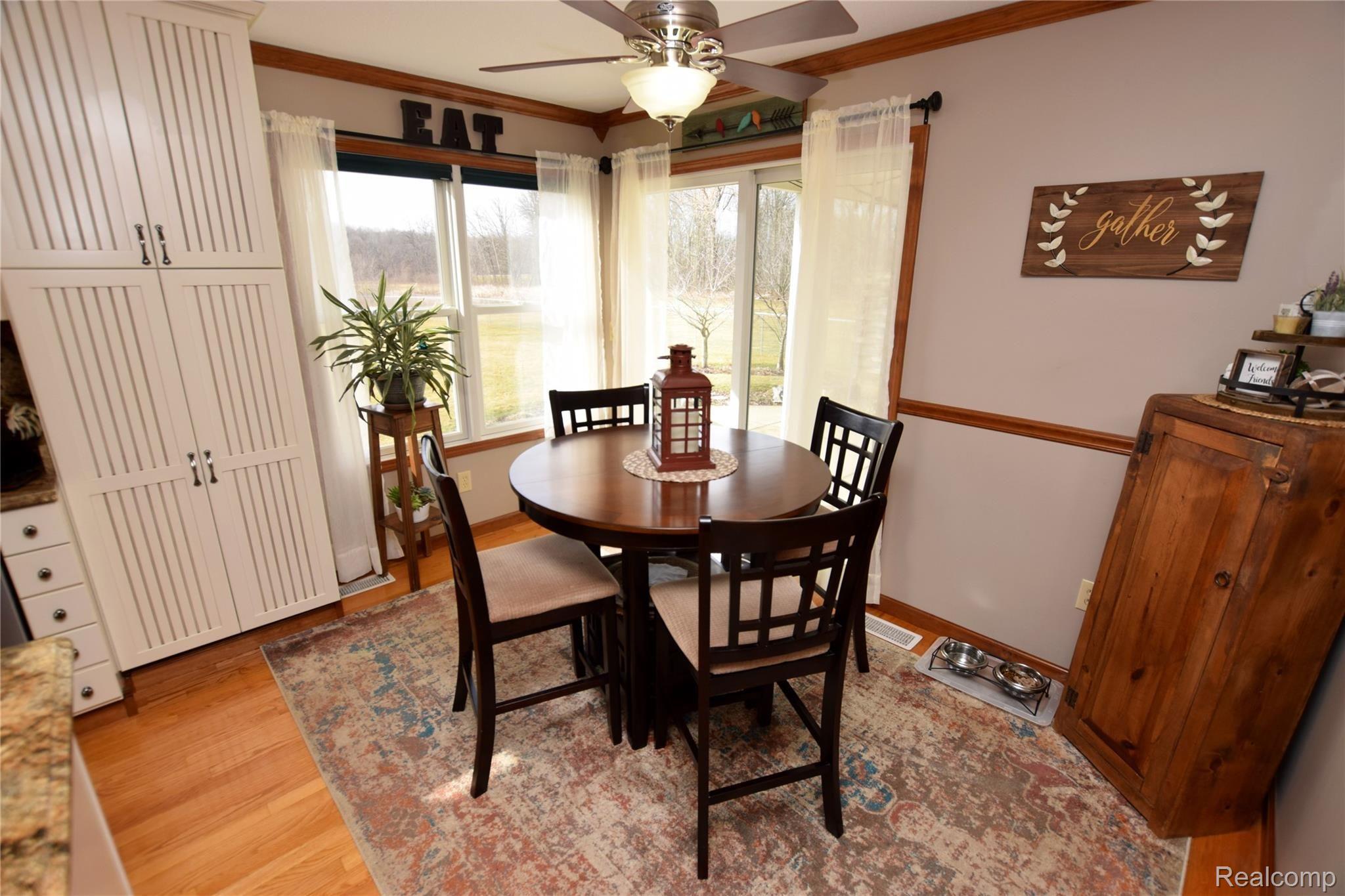 9247 Cook Road Gaines, MI 48436 - Photo 4 of 25 Kitchen - Dining Area with Walkout