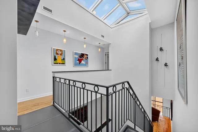 a bedroom with a bed and flat screen tv