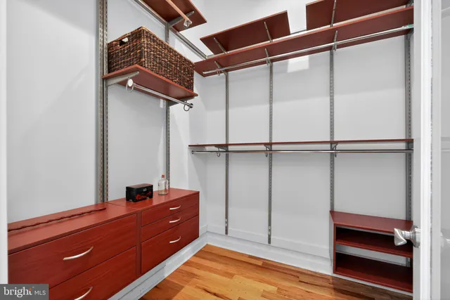 a view of a livingroom with furniture and a gym