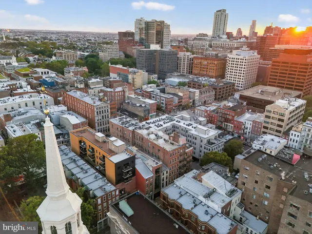 an aerial view of a house with a big yard