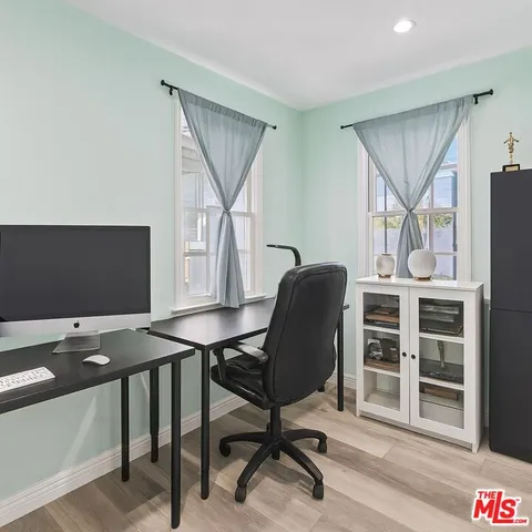 a view of a workspace with furniture