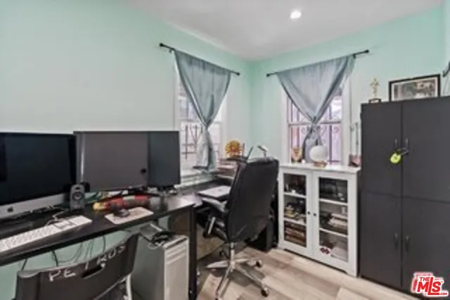 a view of a workspace with furniture