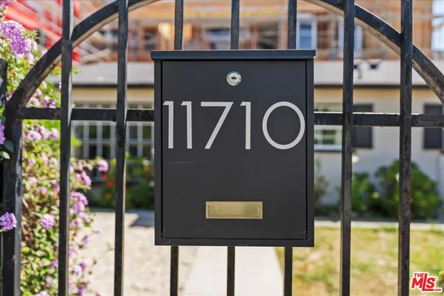 a front view of a house with a glass door