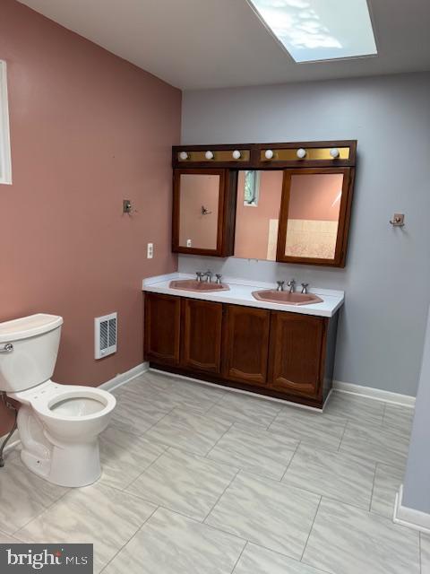 513 Sunset Knoll Road Pasadena, MD 21122 - Photo 11 of 44 Primary Bathroom Double Sink