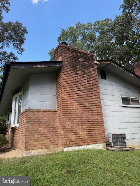 513 Sunset Knoll Road Pasadena, MD 21122 - Photo 38 of 44 Right Side of House and Chimney