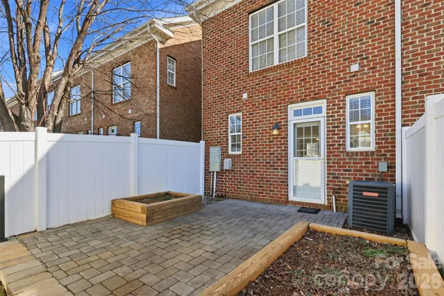 a view of a backyard of the house