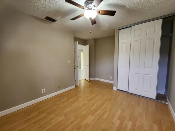 a view of a hallway with a livingroom
