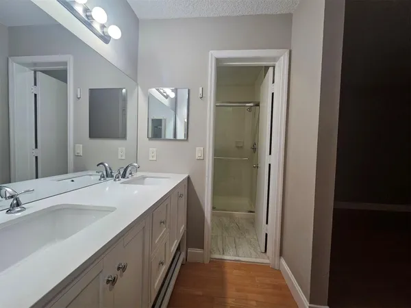 a white toilet sitting next to a bath tub shower
