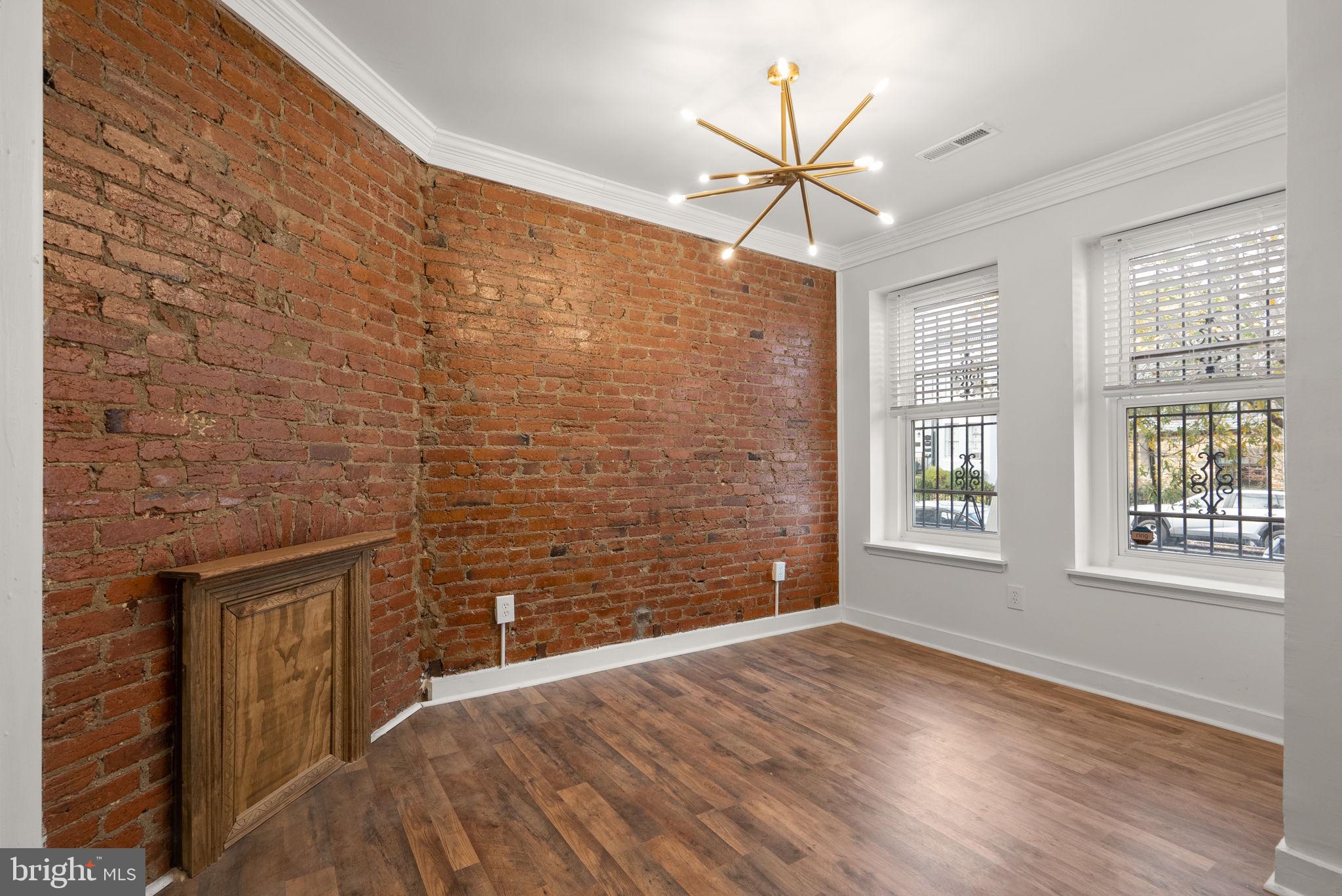 74 O Street Northwest Washington, DC 20001 - Photo 4 of 24 a view of an empty room and a window