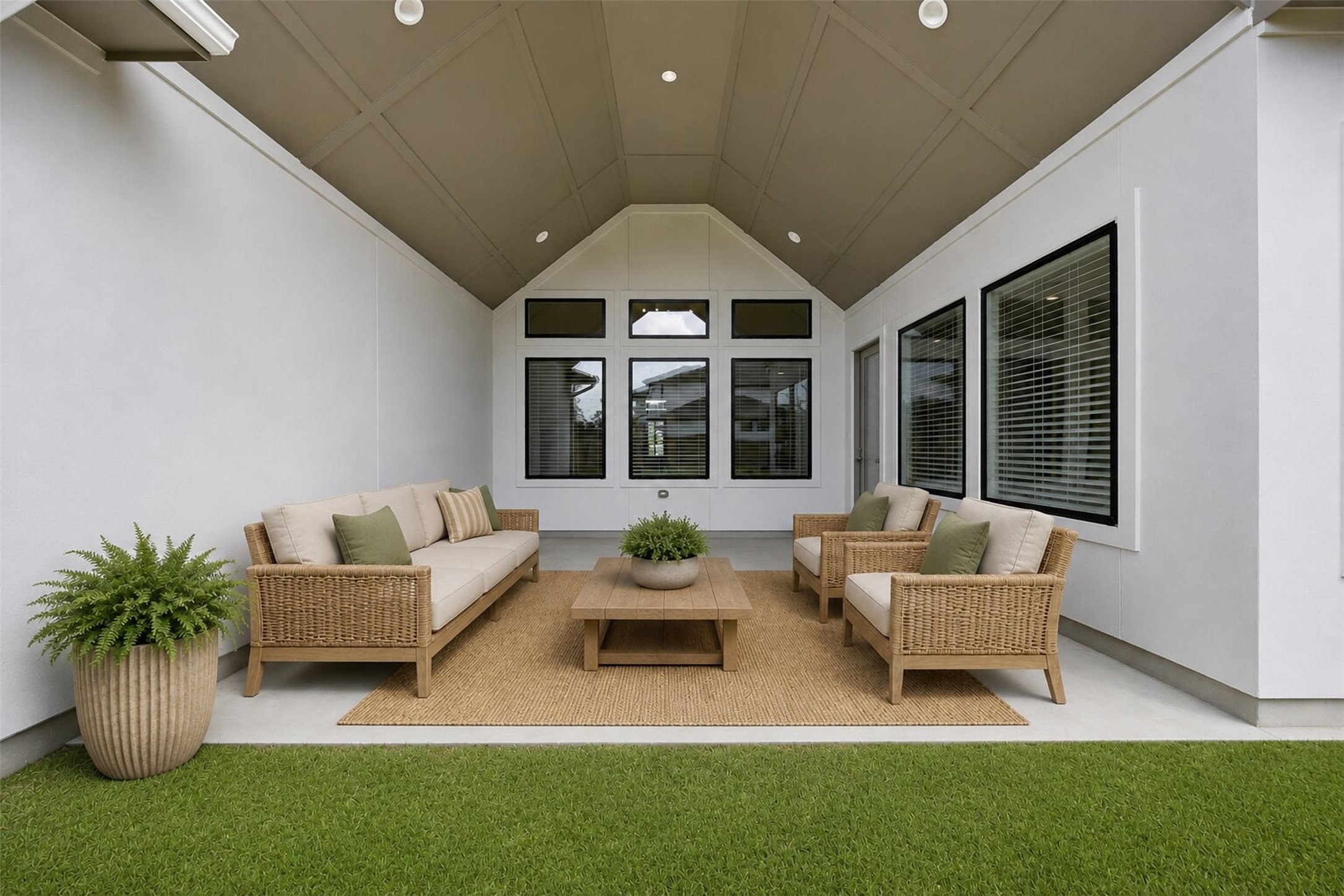 416 Venado View Court Conroe, TX 77304 - Photo 27 of 34
**Virtually Staged** Expansive covered outdoor living area featuring vaulted ceilings and seamless indoor-outdoor flow - ideal for entertaining year-round.