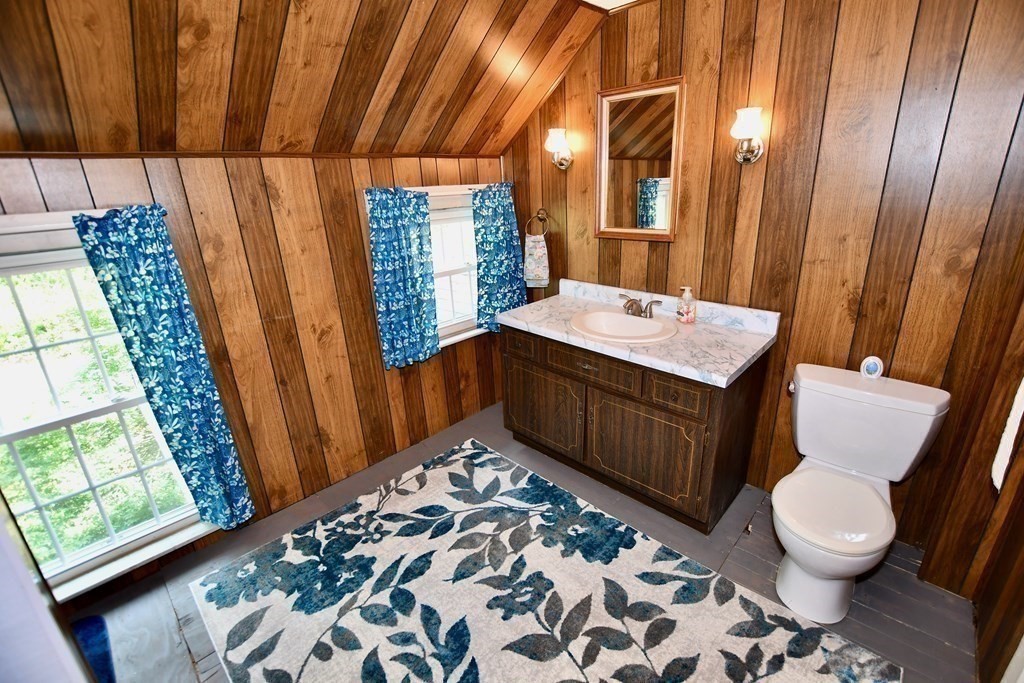 78 East Colrain Road Colrain, MA 01340 - Photo 18 of 27 a bathroom with a sink a toilet and shower curtain