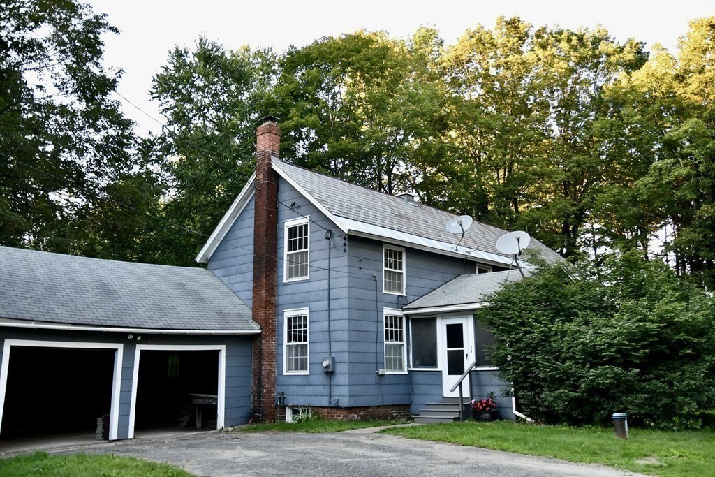 78 East Colrain Road Colrain, MA 01340 - Photo 2 of 27 a front view of a house with garden
