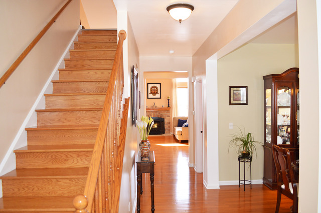1219 Mariemont Road Sugar Grove, IL 60554 - Photo 3 of 25 a view of an entryway with wooden floor and a livingroom view