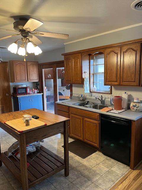 622 North 14th Street Memphis, TX 79245 - Photo 28 of 29 a kitchen with a stove a sink and cabinets