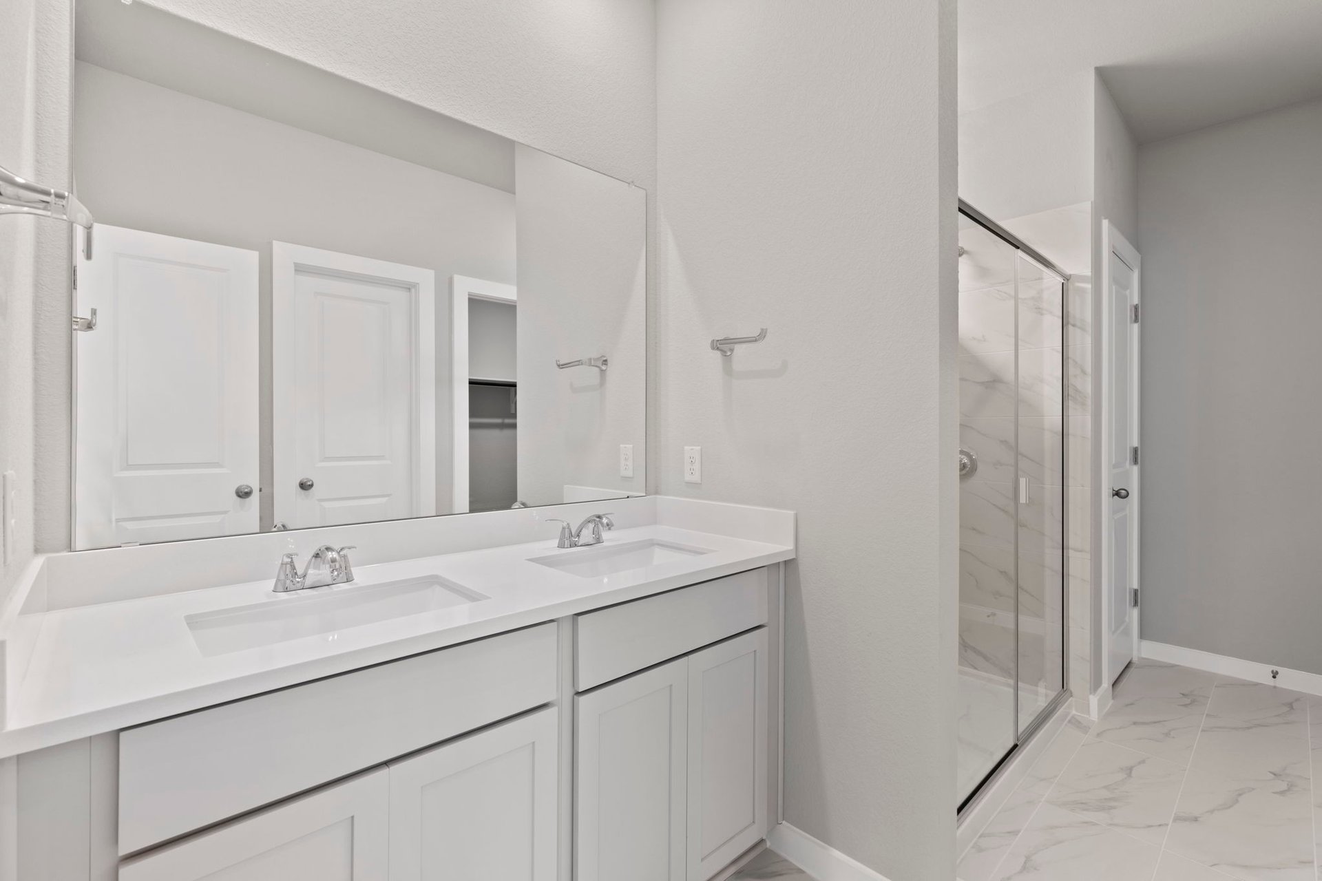 13621 Gray Landing Drive Elgin, TX 78621 - Photo 20 of 36 a bathroom with a sink and a mirror