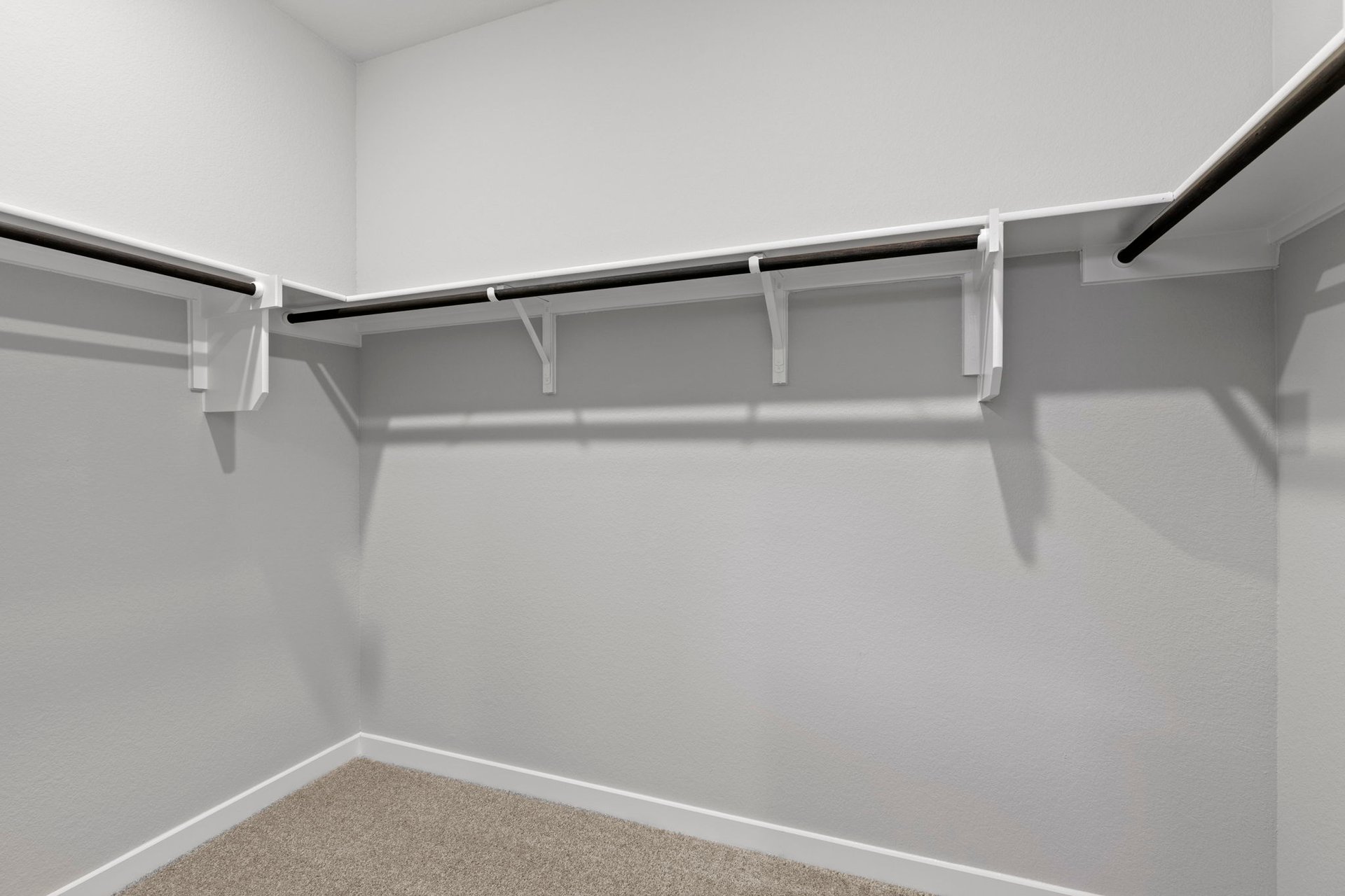 13621 Gray Landing Drive Elgin, TX 78621 - Photo 23 of 36 a view of an empty walk in closet