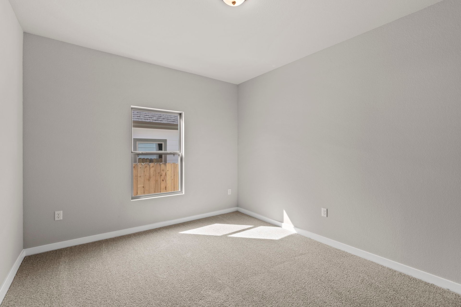13621 Gray Landing Drive Elgin, TX 78621 - Photo 25 of 36 an empty room with a window