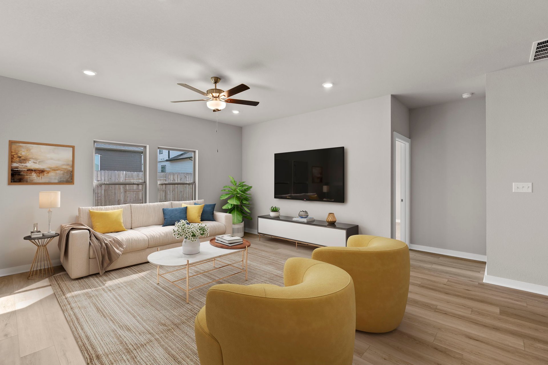 13621 Gray Landing Drive Elgin, TX 78621 - Photo 6 of 36 a living room with furniture and a flat screen tv