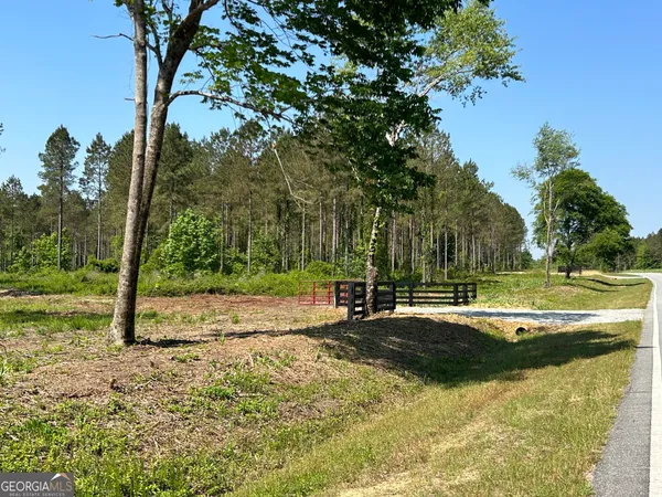 a view of a playground with basketball court