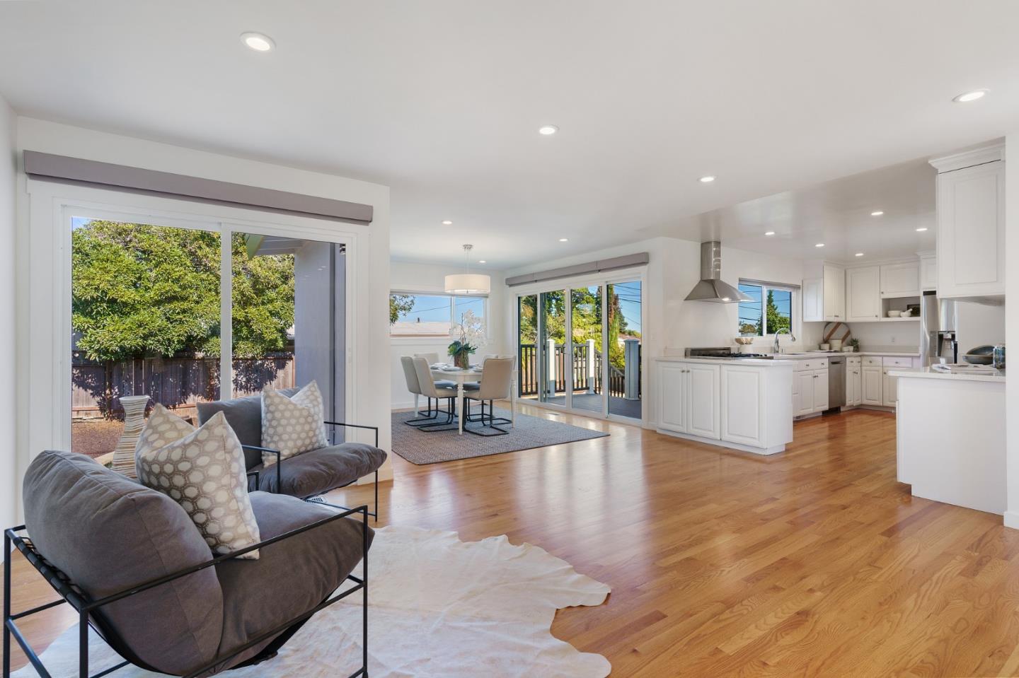 1150 Elmwood Drive Millbrae, CA 94030 - Photo 11 of 46 a living room with furniture and a large window
