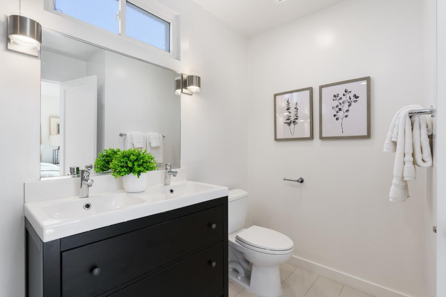 1150 Elmwood Drive Millbrae, CA 94030 - Photo 26 of 46 a bathroom with a sink mirror and toilet