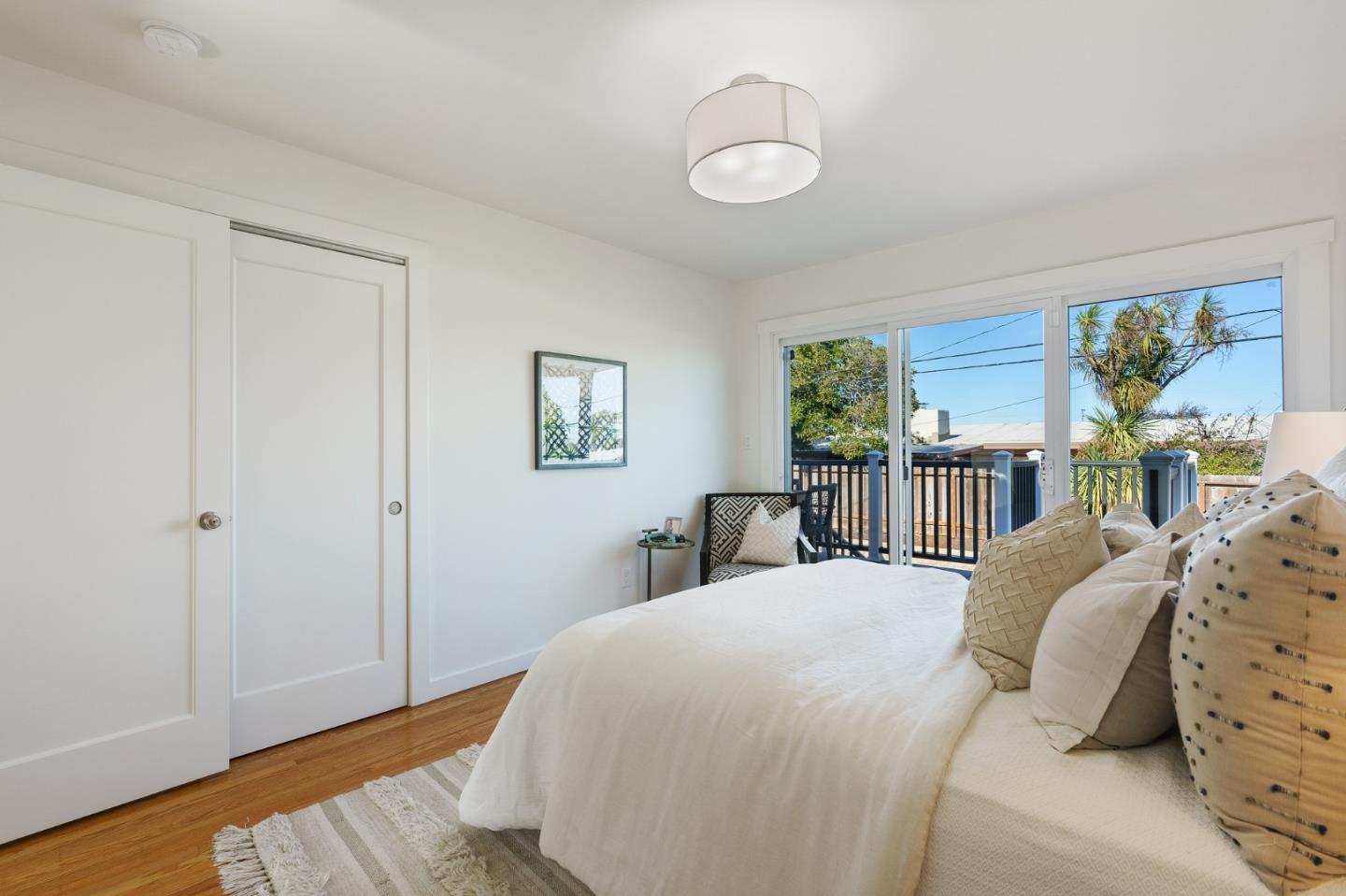 1150 Elmwood Drive Millbrae, CA 94030 - Photo 29 of 46 a bedroom with a large bed and a window