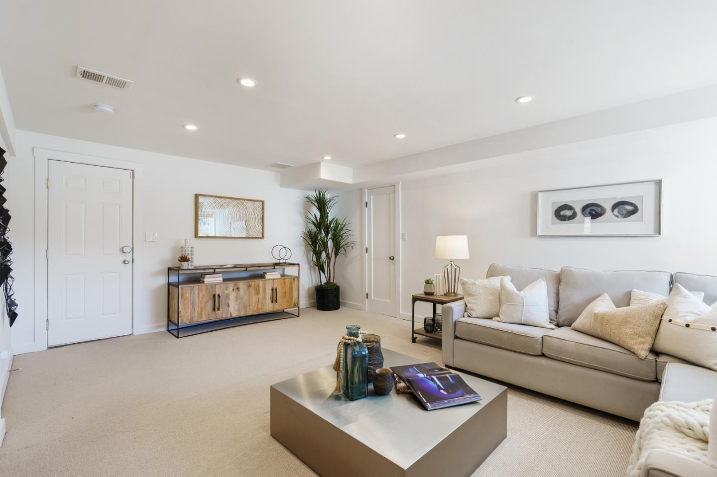 1150 Elmwood Drive Millbrae, CA 94030 - Photo 34 of 46 a living room with furniture and a flat screen tv