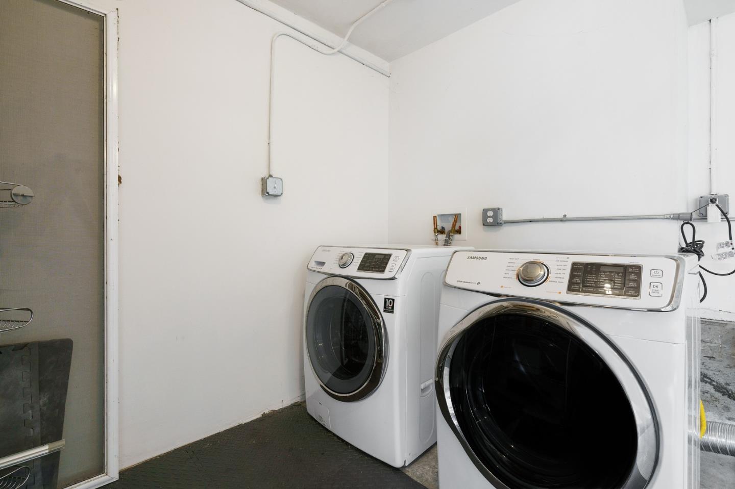 1150 Elmwood Drive Millbrae, CA 94030 - Photo 40 of 46 a utility room with dryer and washer