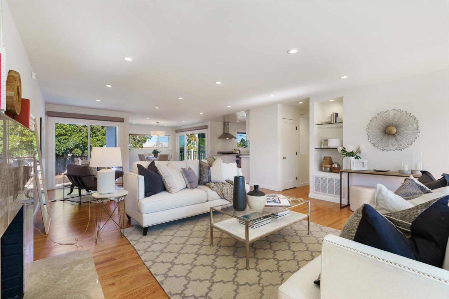 1150 Elmwood Drive Millbrae, CA 94030 - Photo 5 of 46 a living room with furniture and a large window
