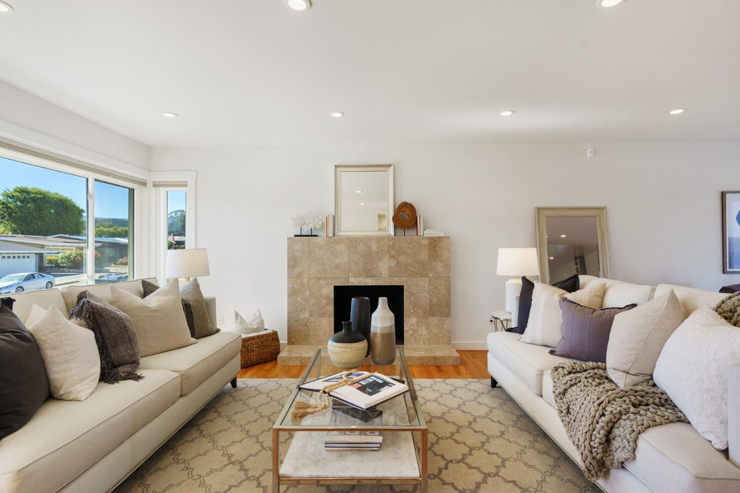 1150 Elmwood Drive Millbrae, CA 94030 - Photo 6 of 46 a living room with furniture and a fireplace