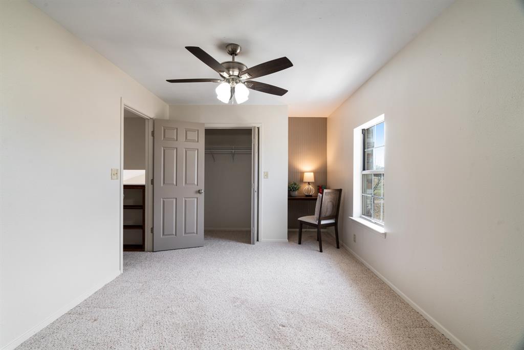 374 County Road Paris, TX 75462 - Photo 21 of 38 a view of empty room with wooden floor and window
