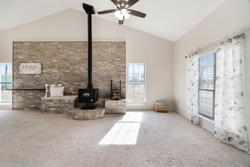 374 County Road Paris, TX 75462 - Photo 3 of 38 a living room with furniture and floor to ceiling window