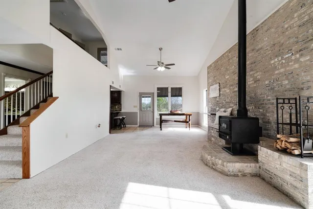a view of kitchen with furniture and staircase