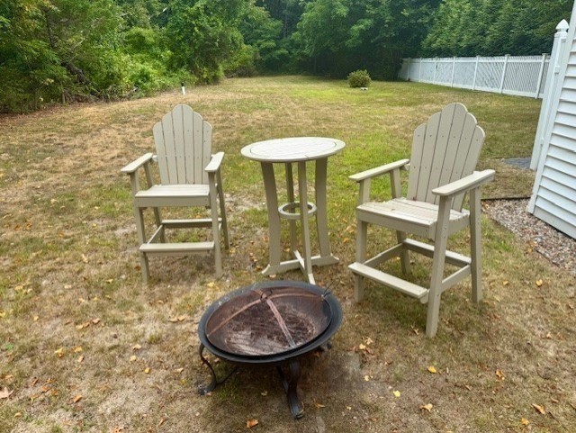 428 Main Street Barnstable, MA 02635 - Photo 9 of 25 a backyard of a house with table and chairs