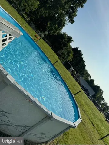 a view of swimming pool from a balcony
