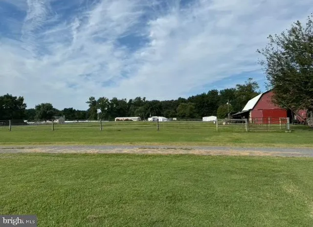 a view of a golf course with a lake