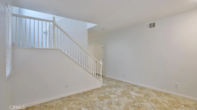 a view of entryway with stairs