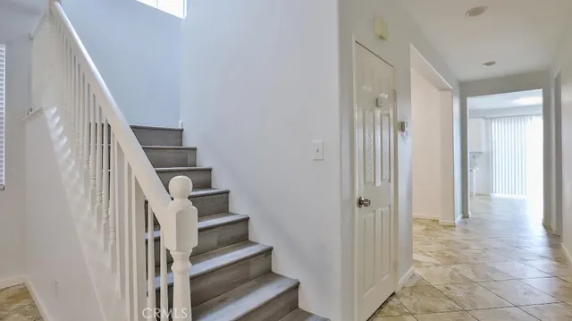 a view of an entryway with staircase